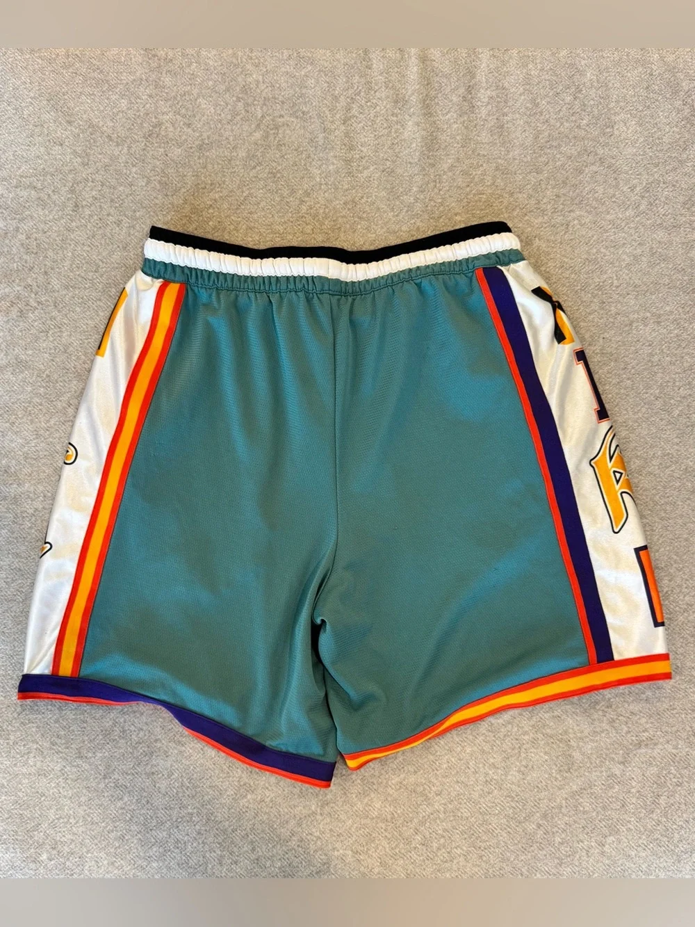 Nike Teal Basketball Shorts with Multicolor Side Panels